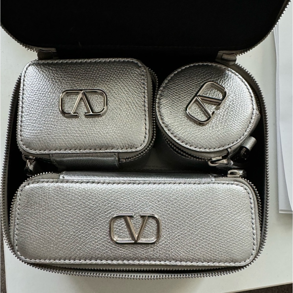 Valentino. Travel box with small compartments can even be used as a purse